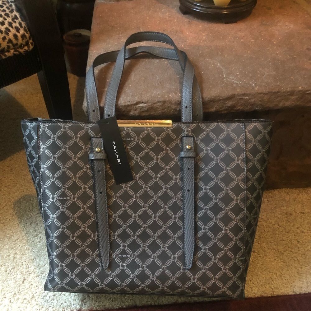 Tahari NWT gray tote bag with adjustable Handles. Zipped inside pocket. Canvas